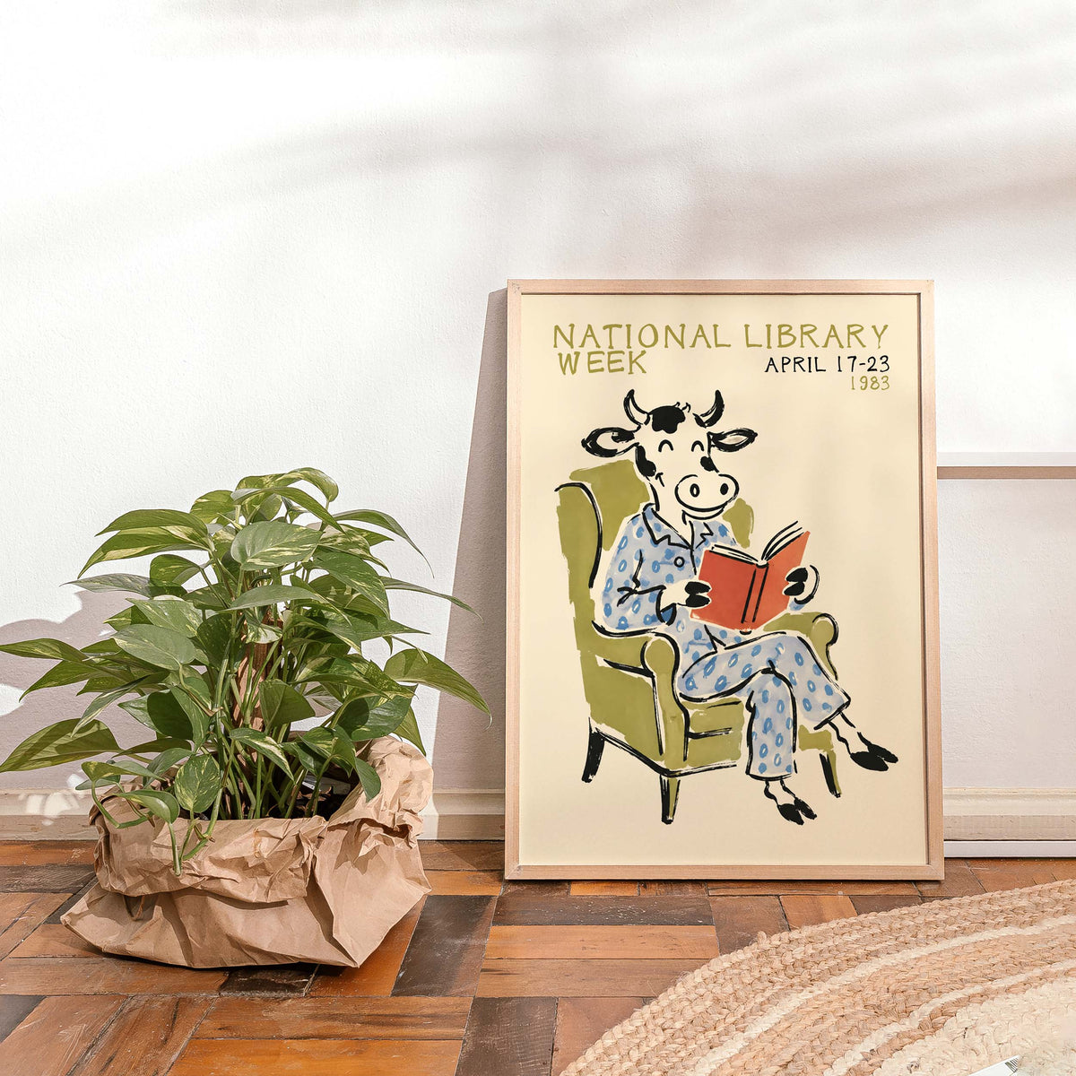 National Library Week Cow Reading Poster